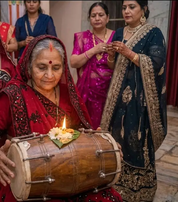 Women celebrating with traditional instruments for Geet Gawai